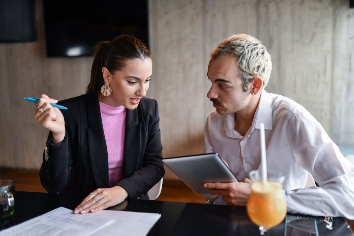 Couple at the table discussing interest rates
