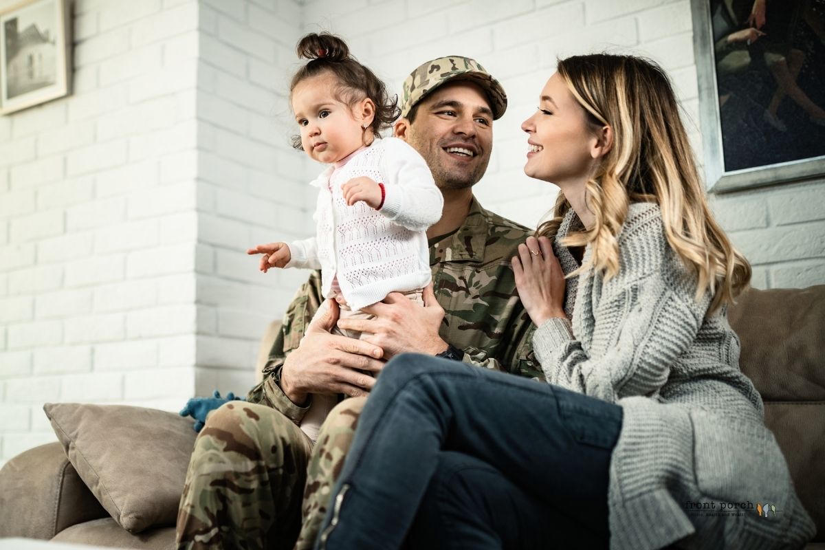 Military couple in their home
